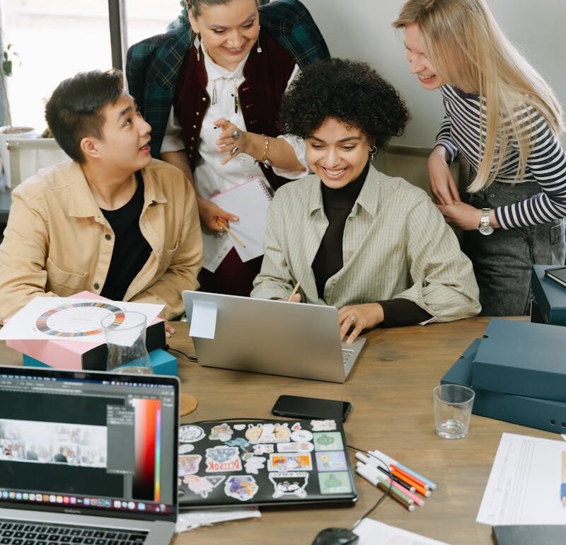 Cheerful Colleagues Working Together